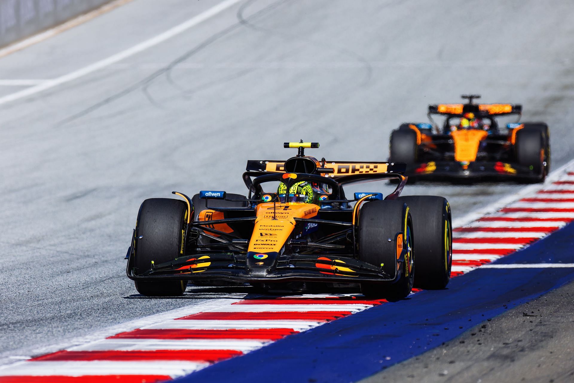 Lando Norris, McLaren Formula 1 Team, drives around the track ahead of his colleague Oscar Piastri, McLaren Formula 1 Team - Source: Getty